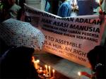 Activists hold candle-light vigil in Penang on a dark day for democracy