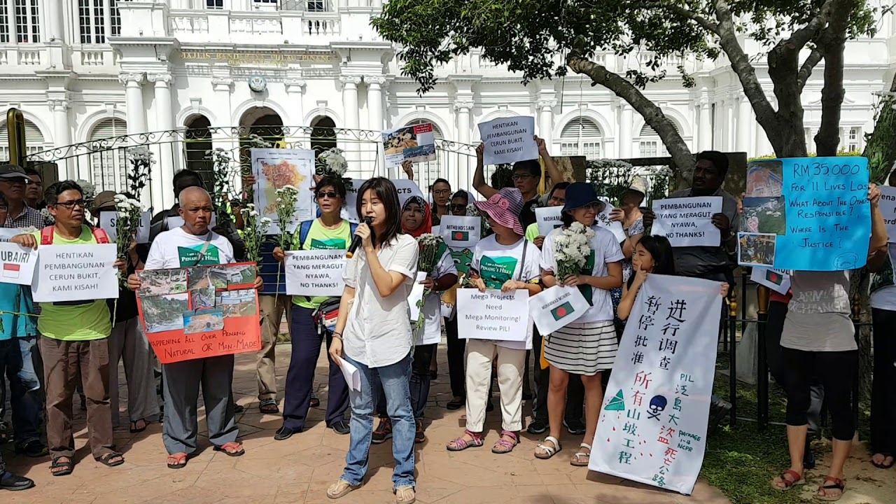 Concerned Penangites hold vigil outside Town Hall as city councillors meet